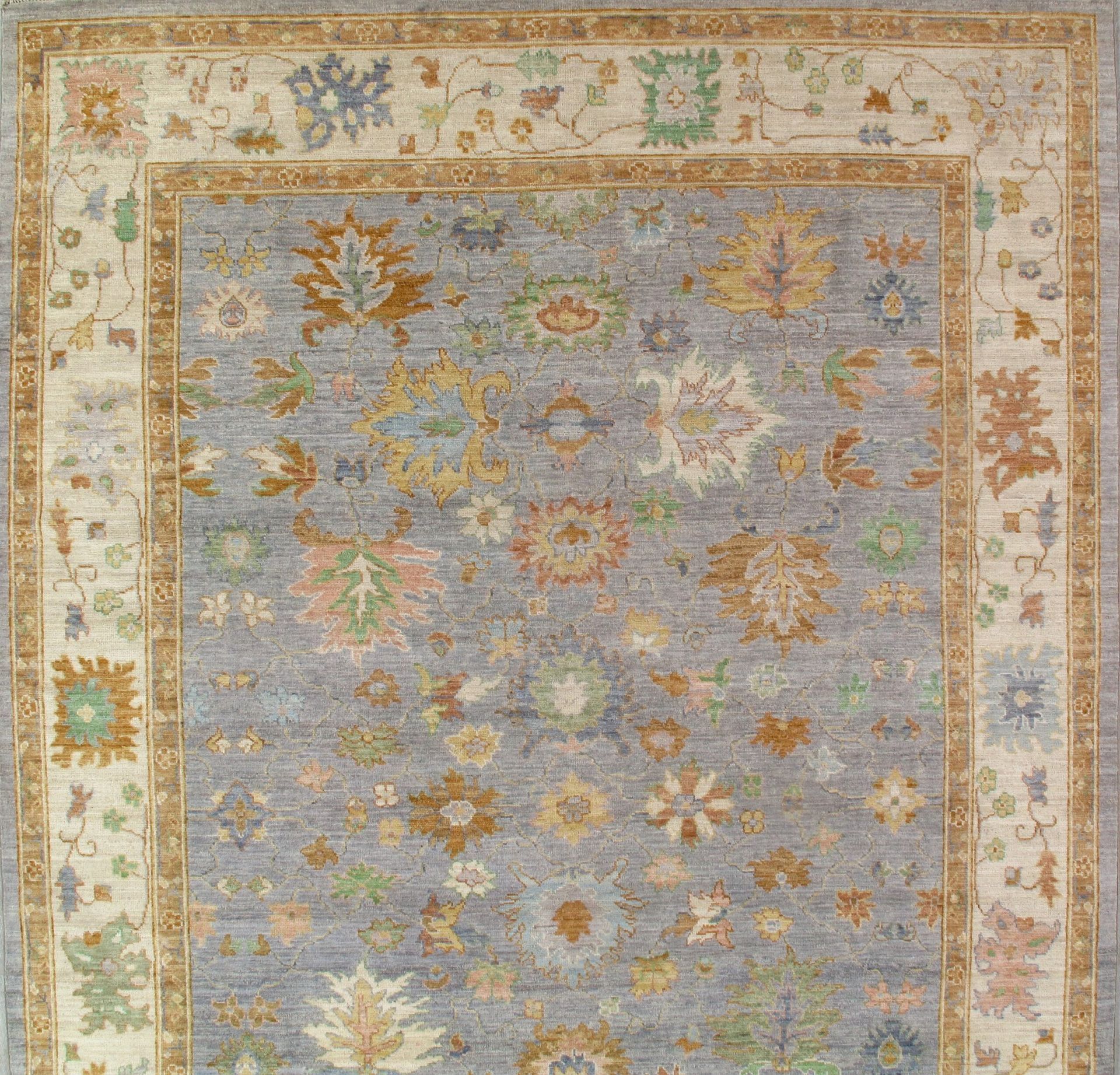 A close up of a rug with a floral pattern on it