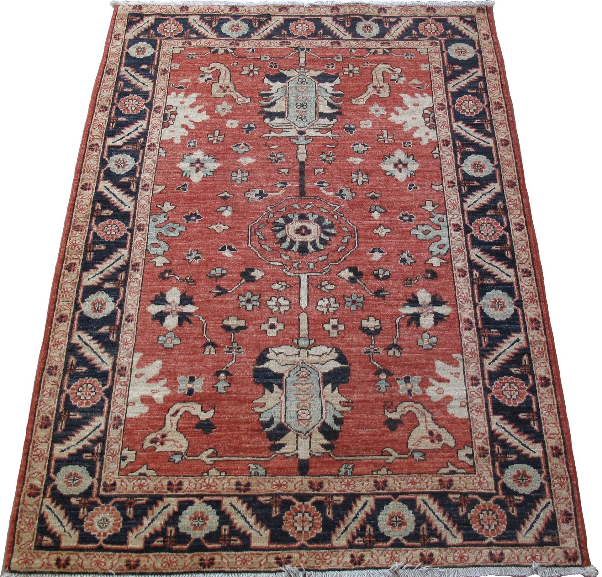 A red rug with a black and white pattern on it
