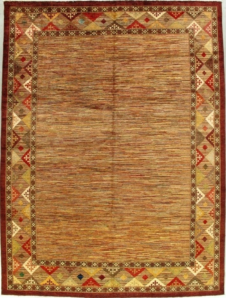 A rug with a geometric pattern and a red border