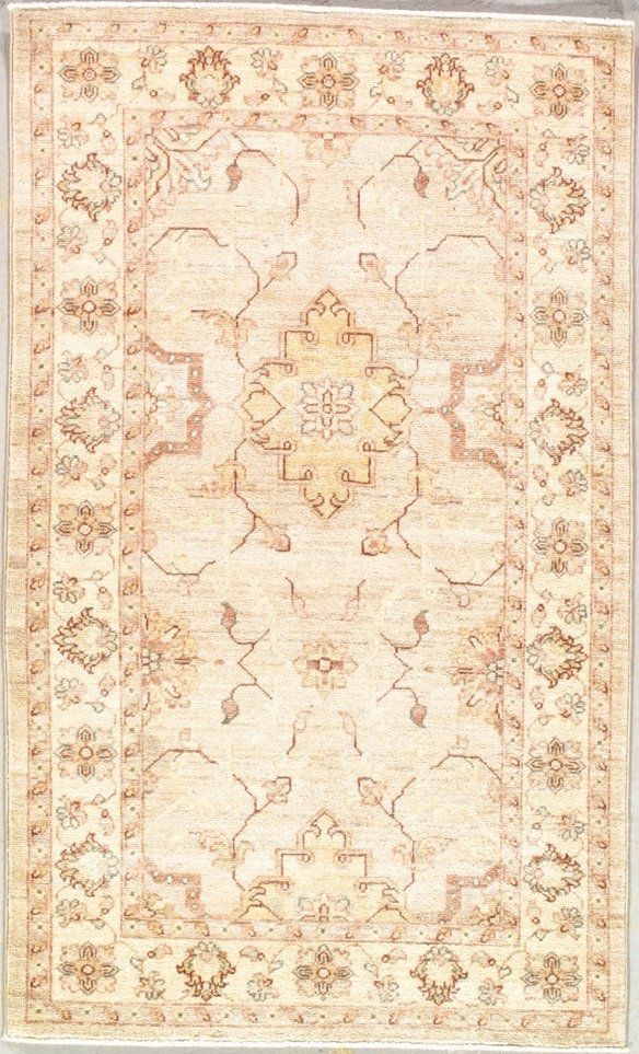 A rug with a floral pattern on it is sitting on a table.