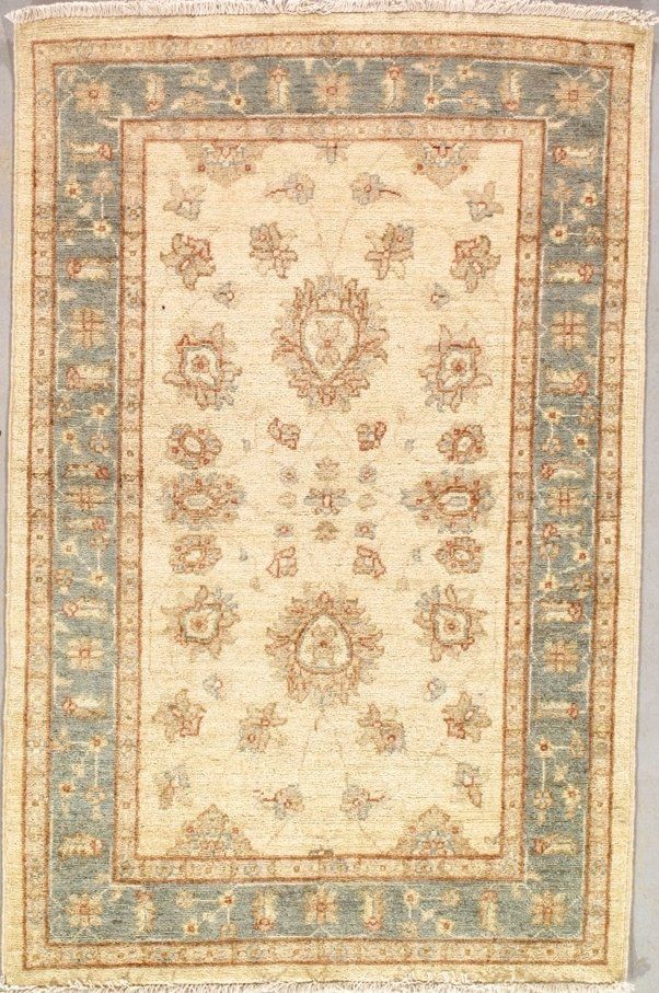 A rug with a floral pattern on it is sitting on a table.