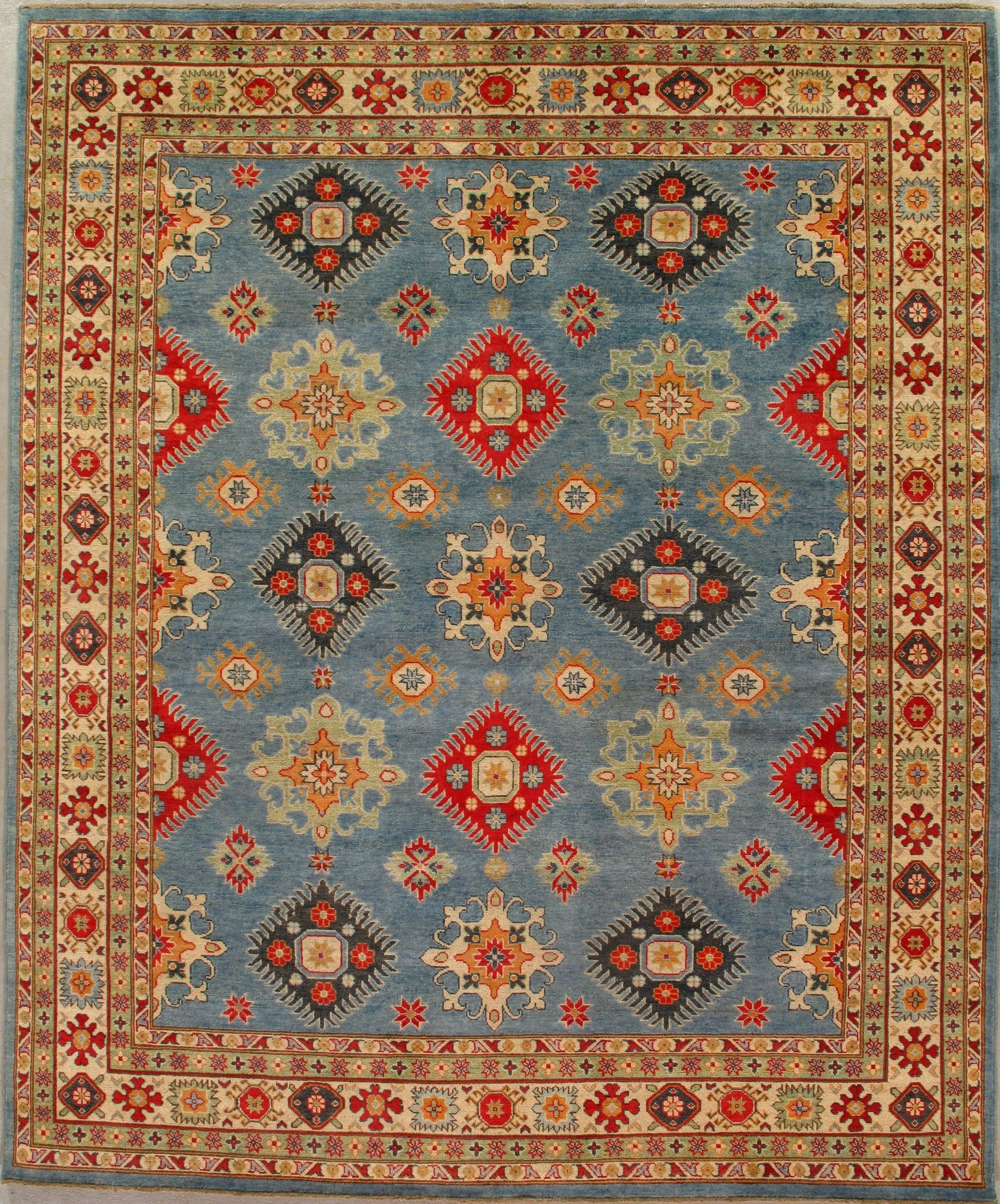 A rug with a blue and red pattern on it