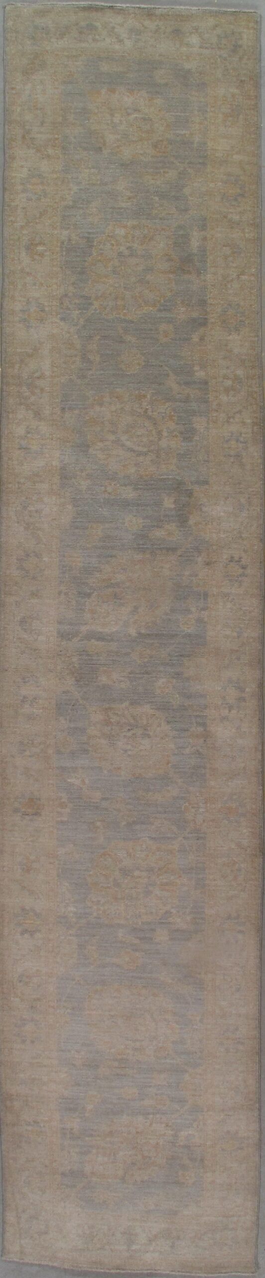 A close up of a wooden surface with a blurred background.