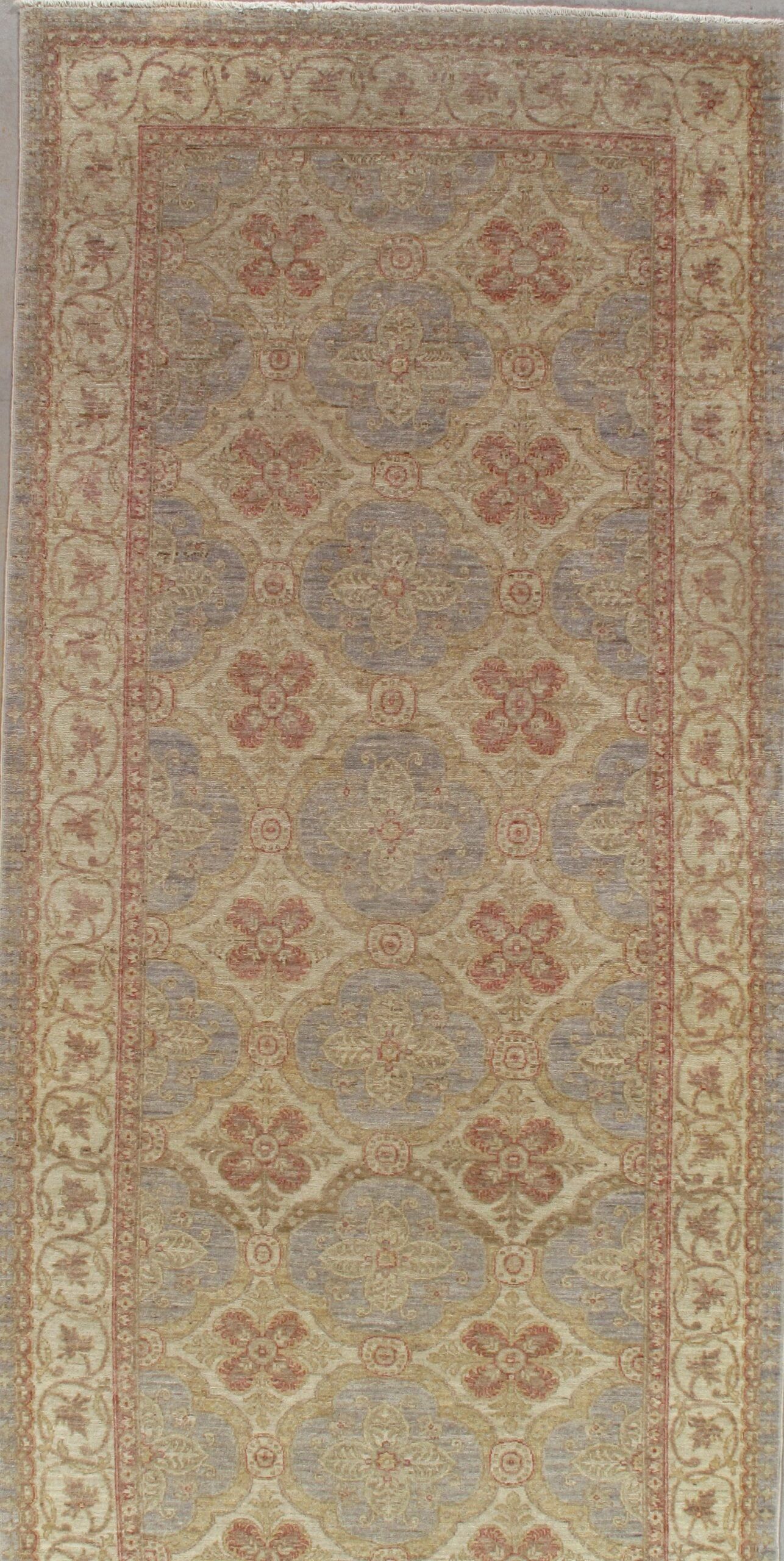 A rug with a pattern on it is sitting on a table.