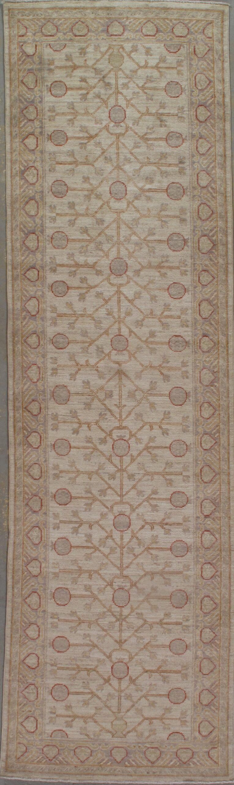 A rug with a pattern on it is sitting on a table.