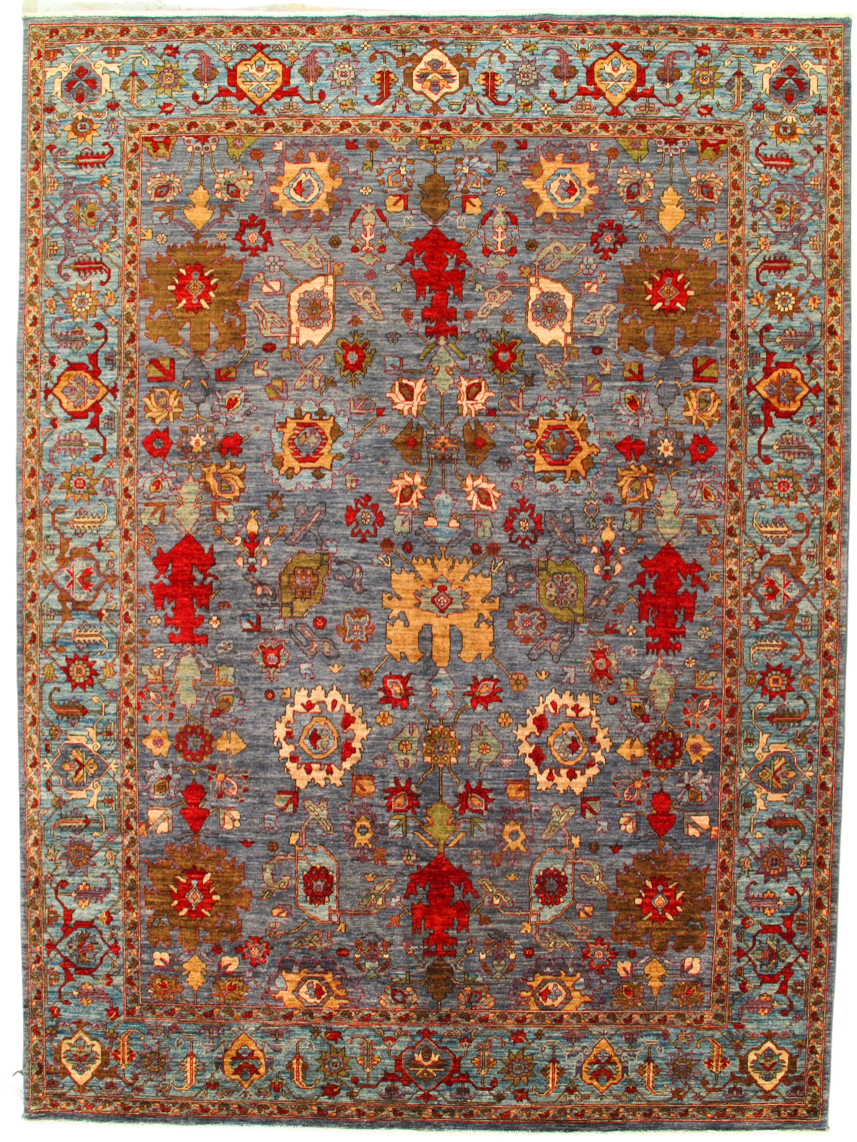 A rug with a floral pattern on it is on a white background.