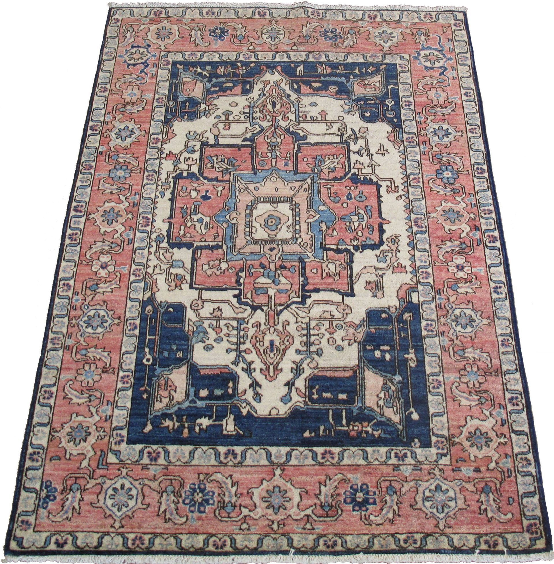 A rug with a blue and pink pattern on it