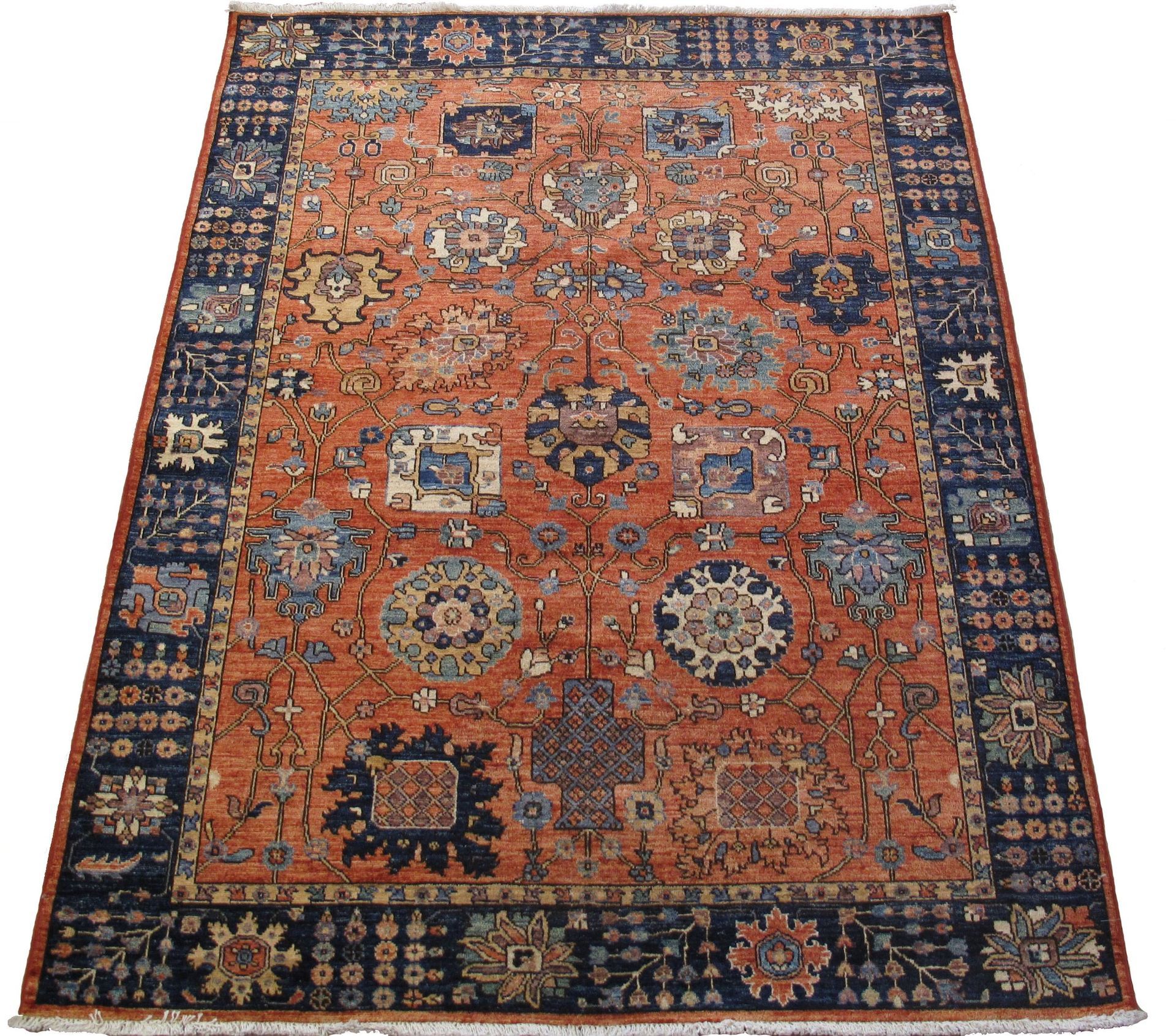 A rug with a pattern of circles and flowers on it