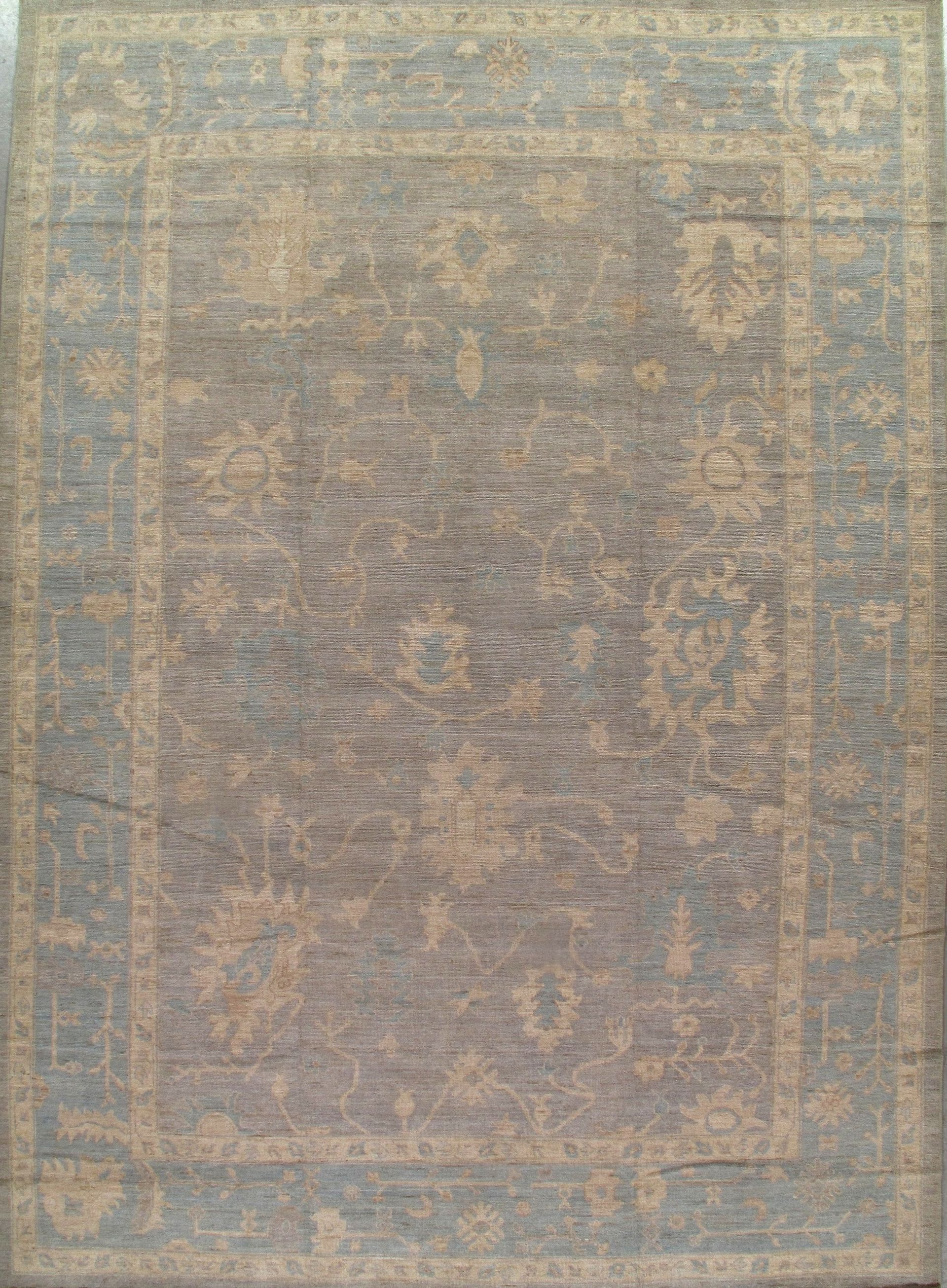 A rug with a floral pattern on it is sitting on a table.