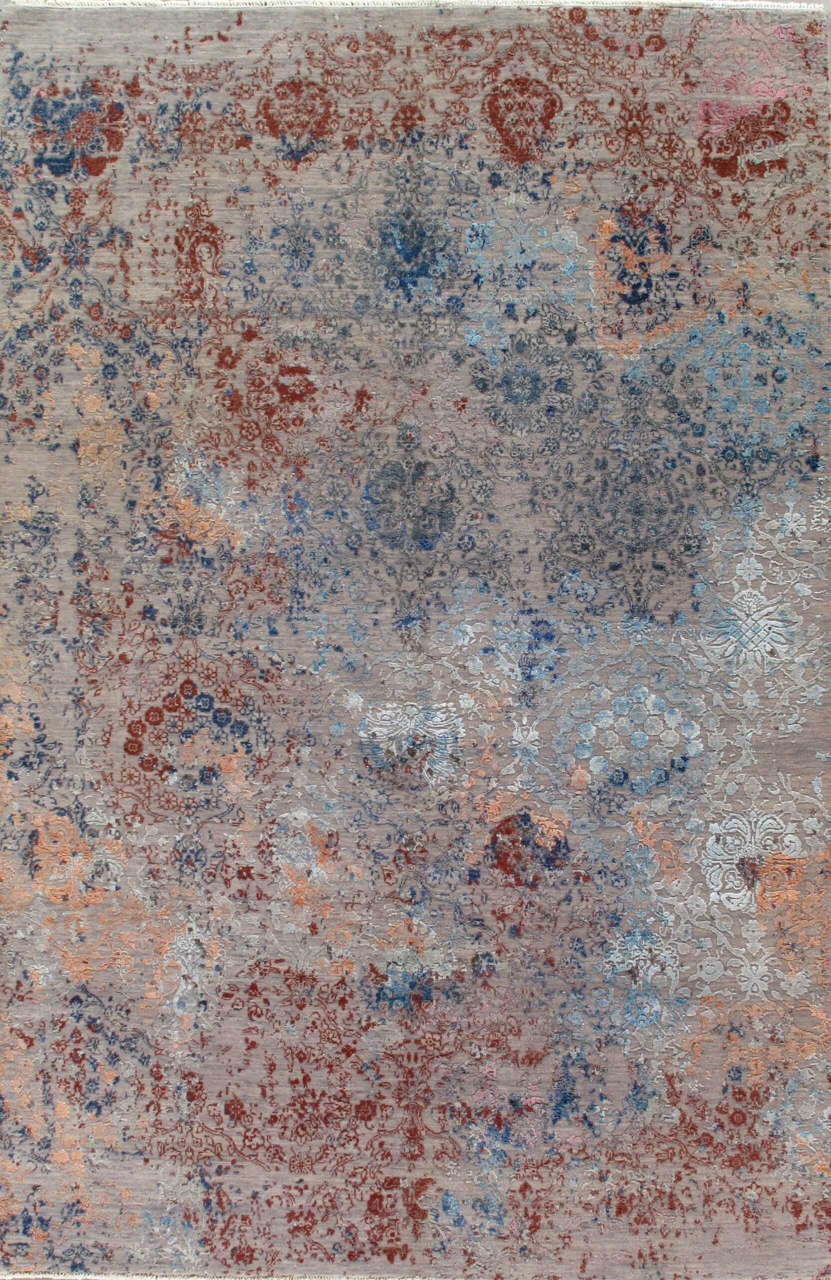 A close up of a rug with a floral pattern on it.