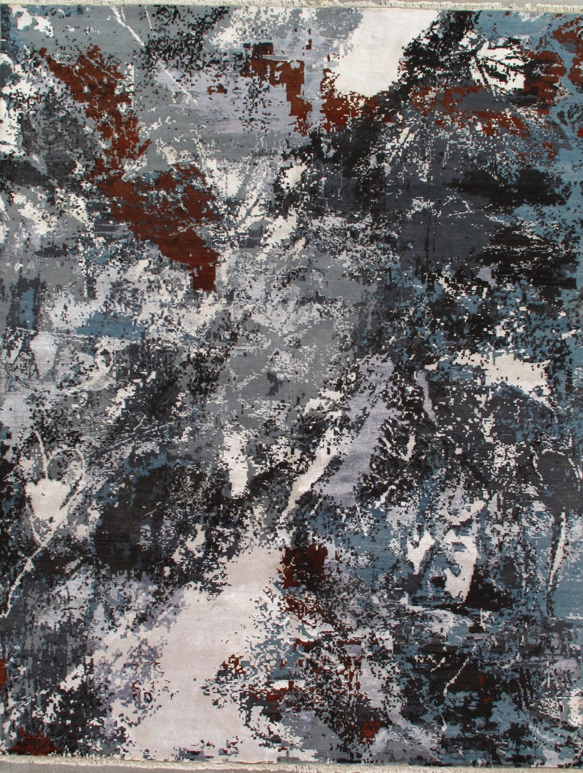 A close up of a rug with a marble pattern