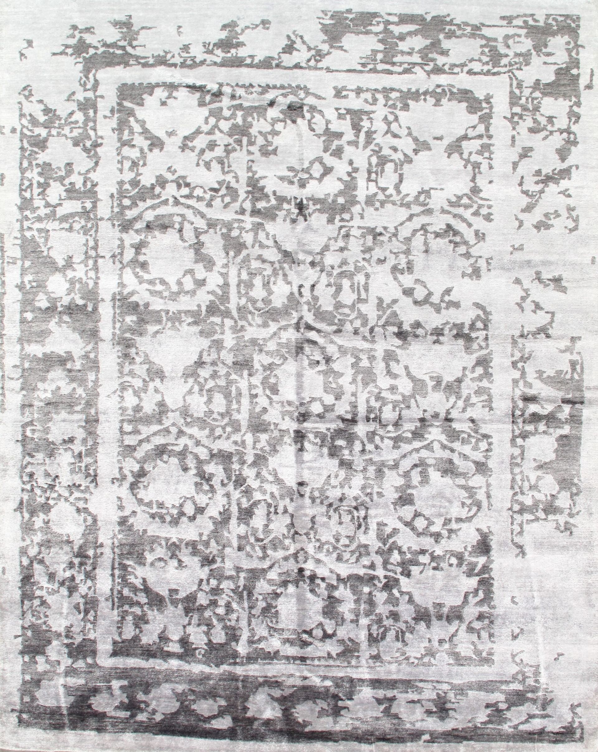 A close up of a rug with a floral pattern on it