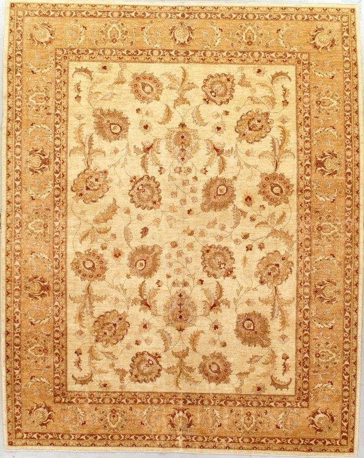 A rug with a pattern of flowers and leaves on it