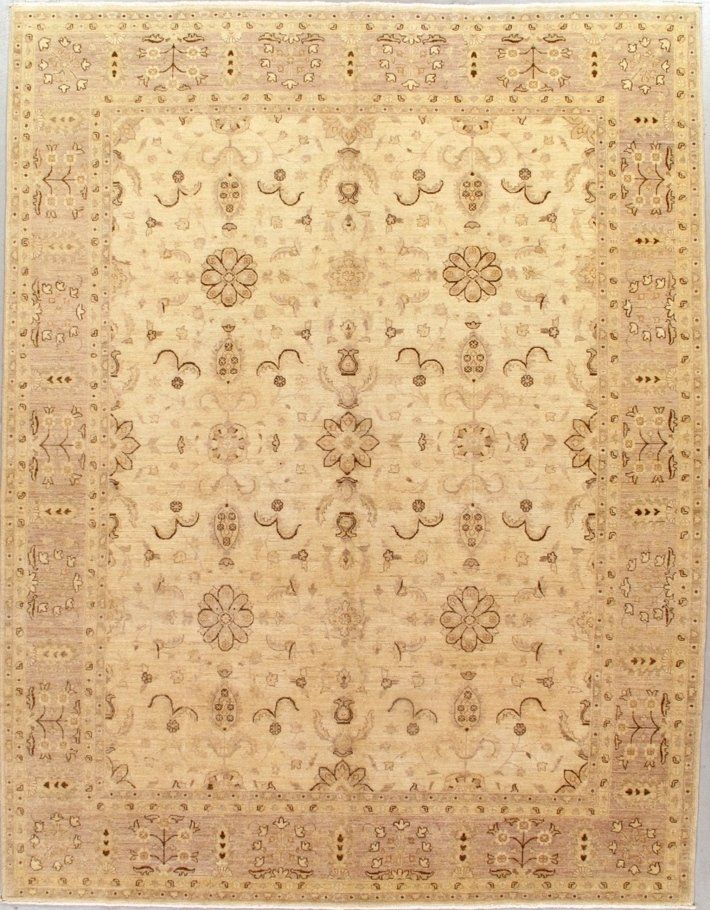 A beige rug with a floral pattern on it