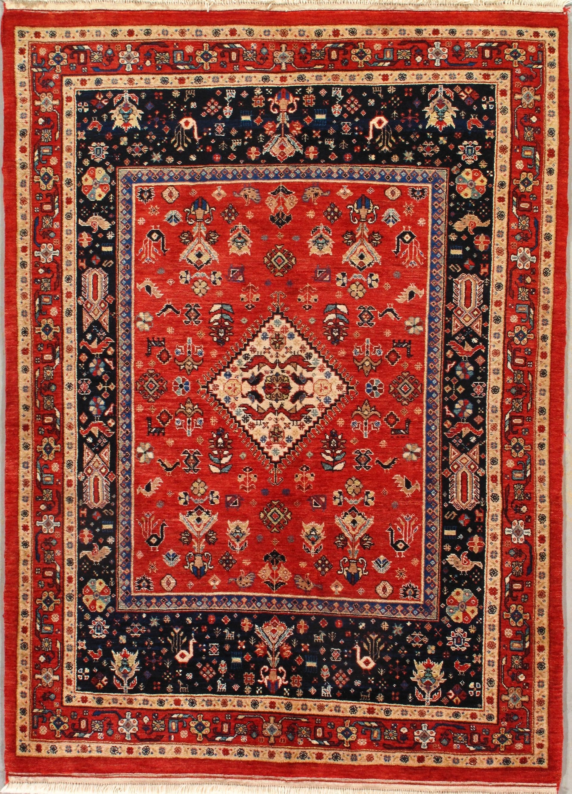 A red and black rug with a diamond in the middle