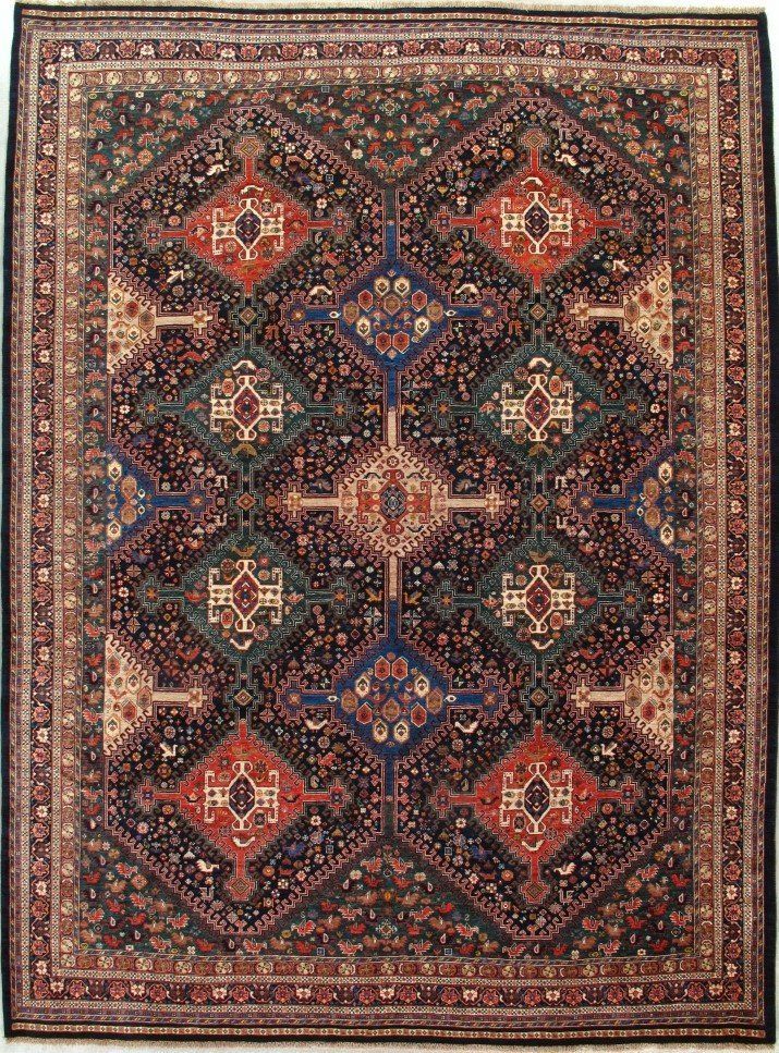 A rug with a floral pattern on it is on a white background.