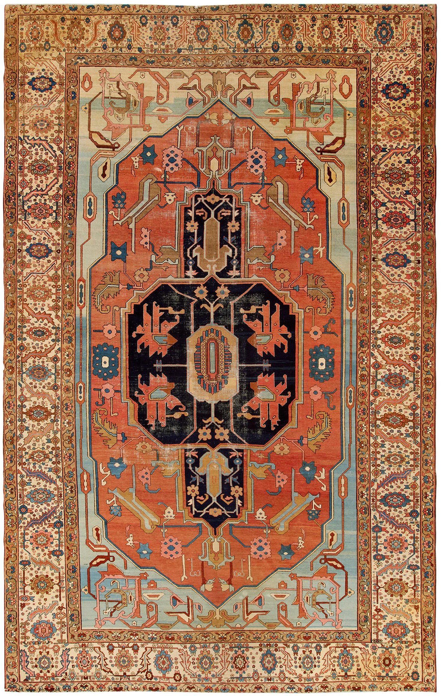 A rug with a floral pattern on it is on a white background.