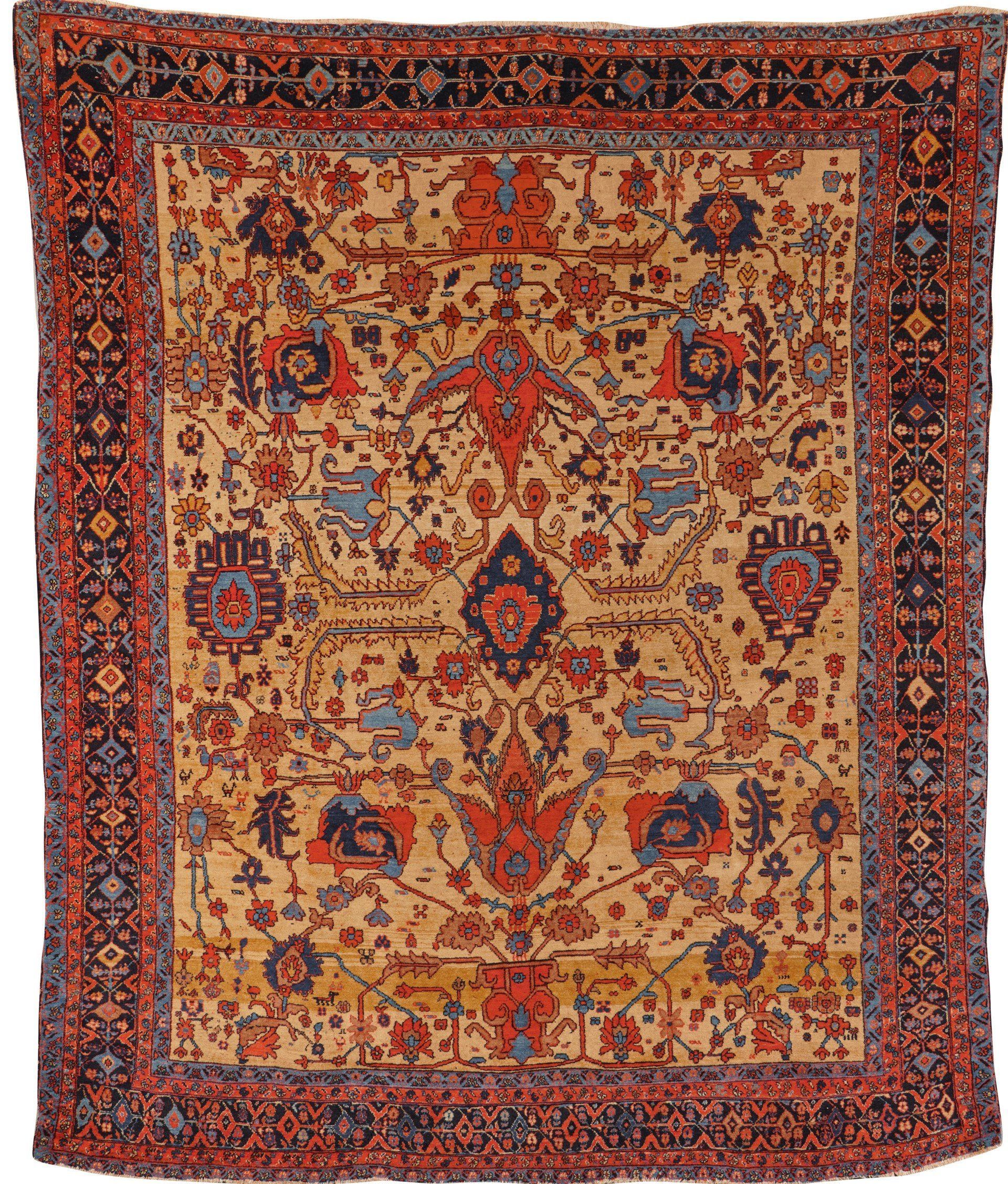A rug with a floral pattern on it is hanging on a wall.