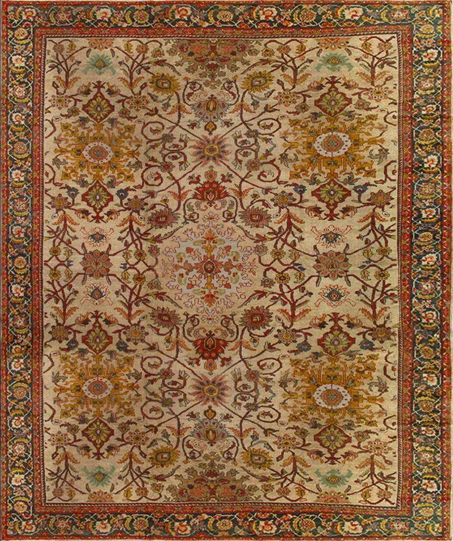 A rug with a floral pattern on it is on a white background.