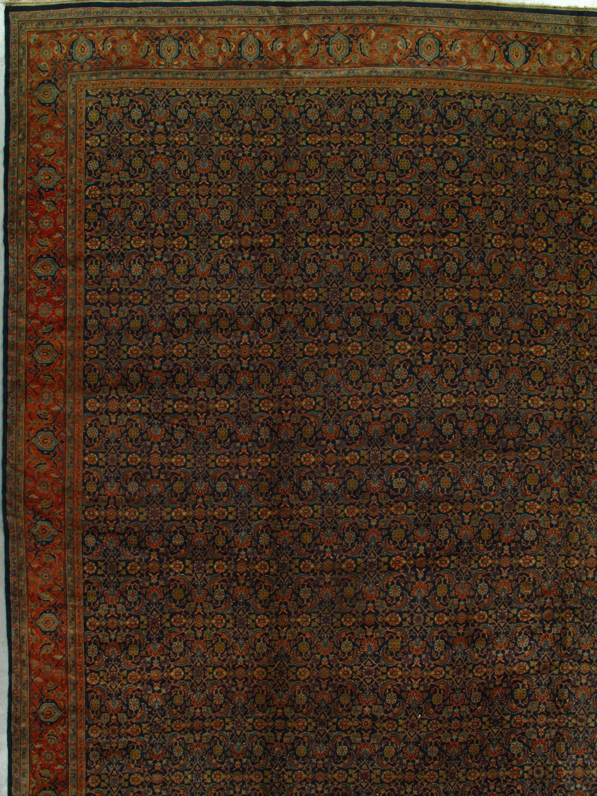 A close up of a rug with a pattern on it.