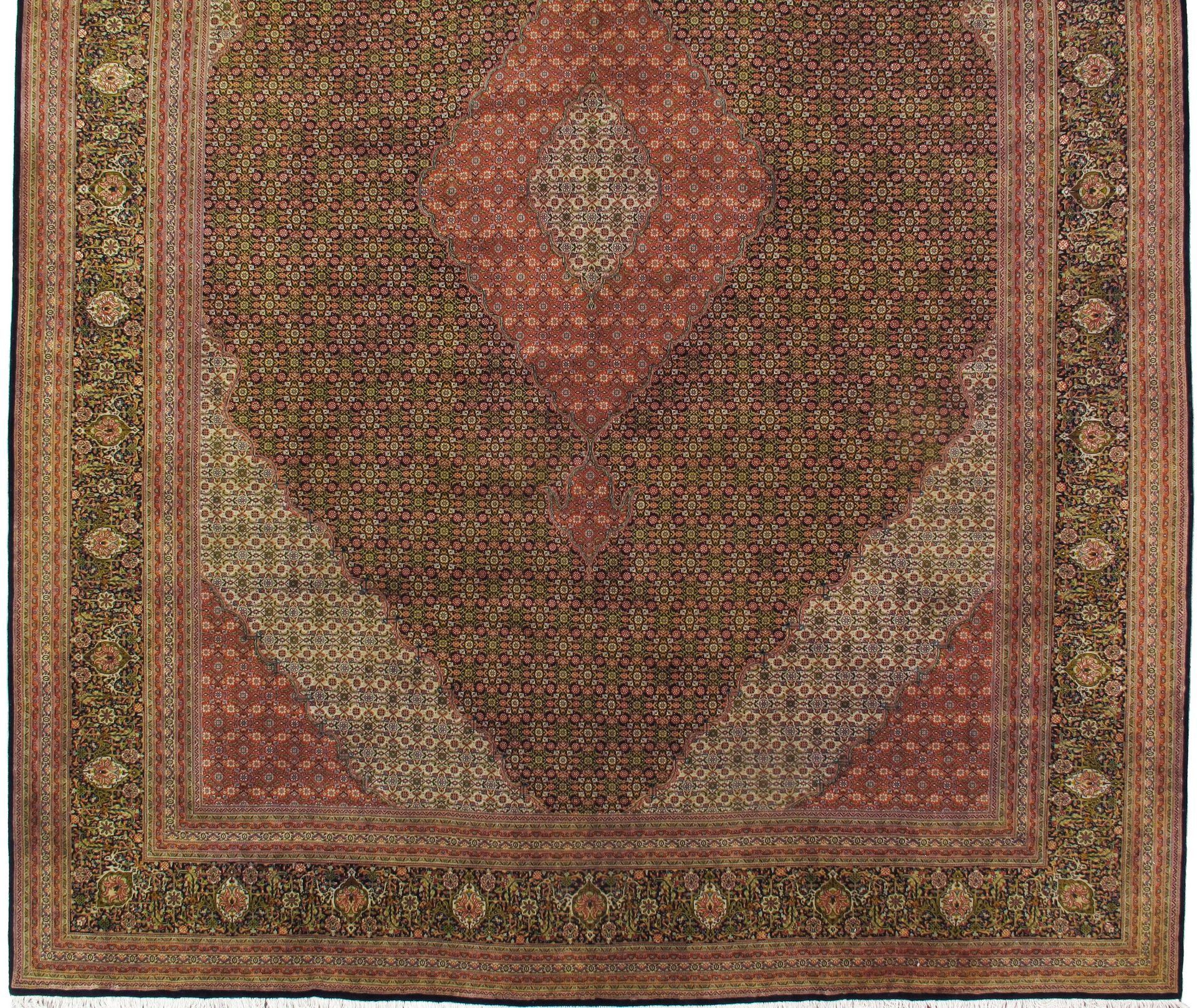 A rug with a floral pattern on it is on a white background.