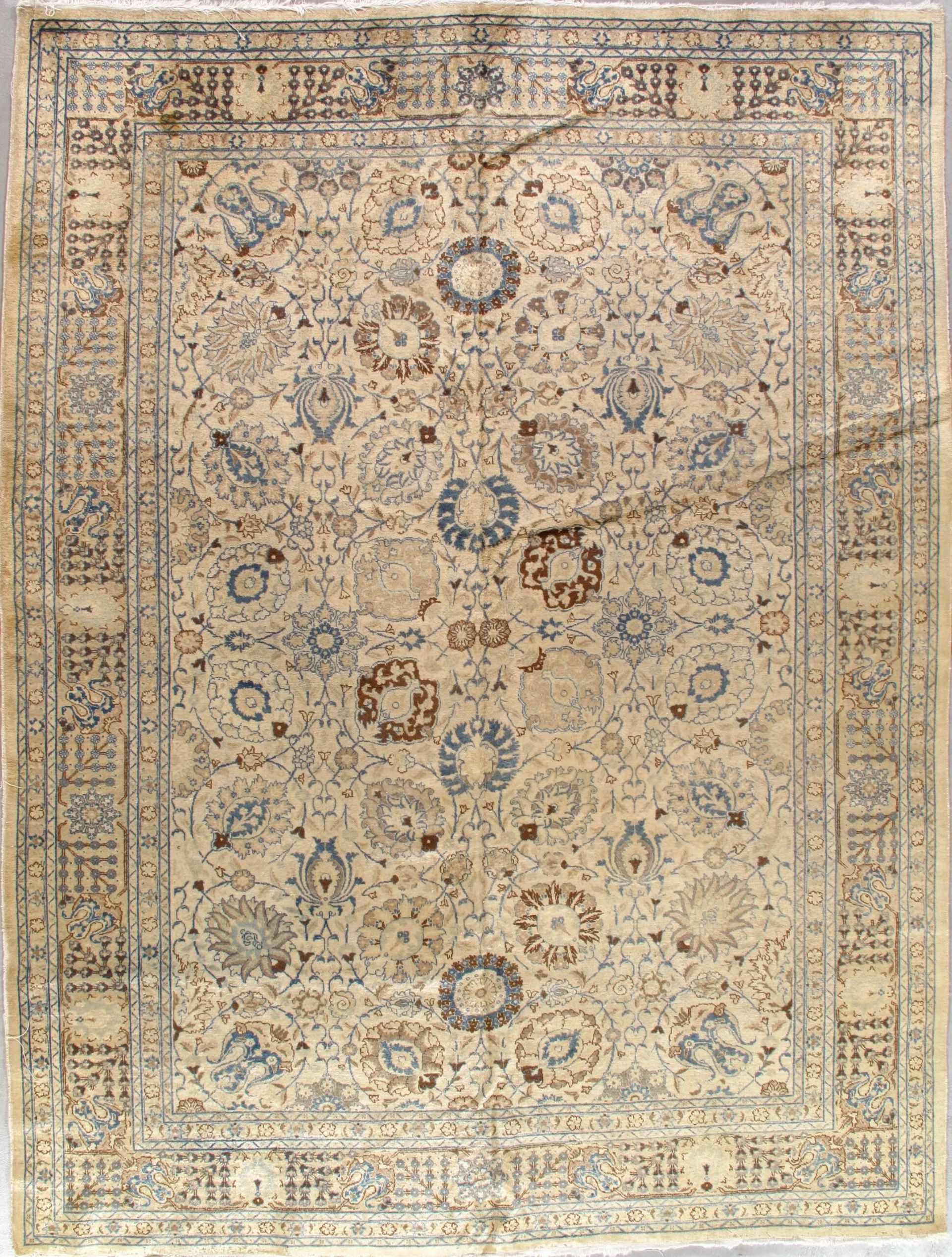 A rug with a floral pattern on it is sitting on a table.