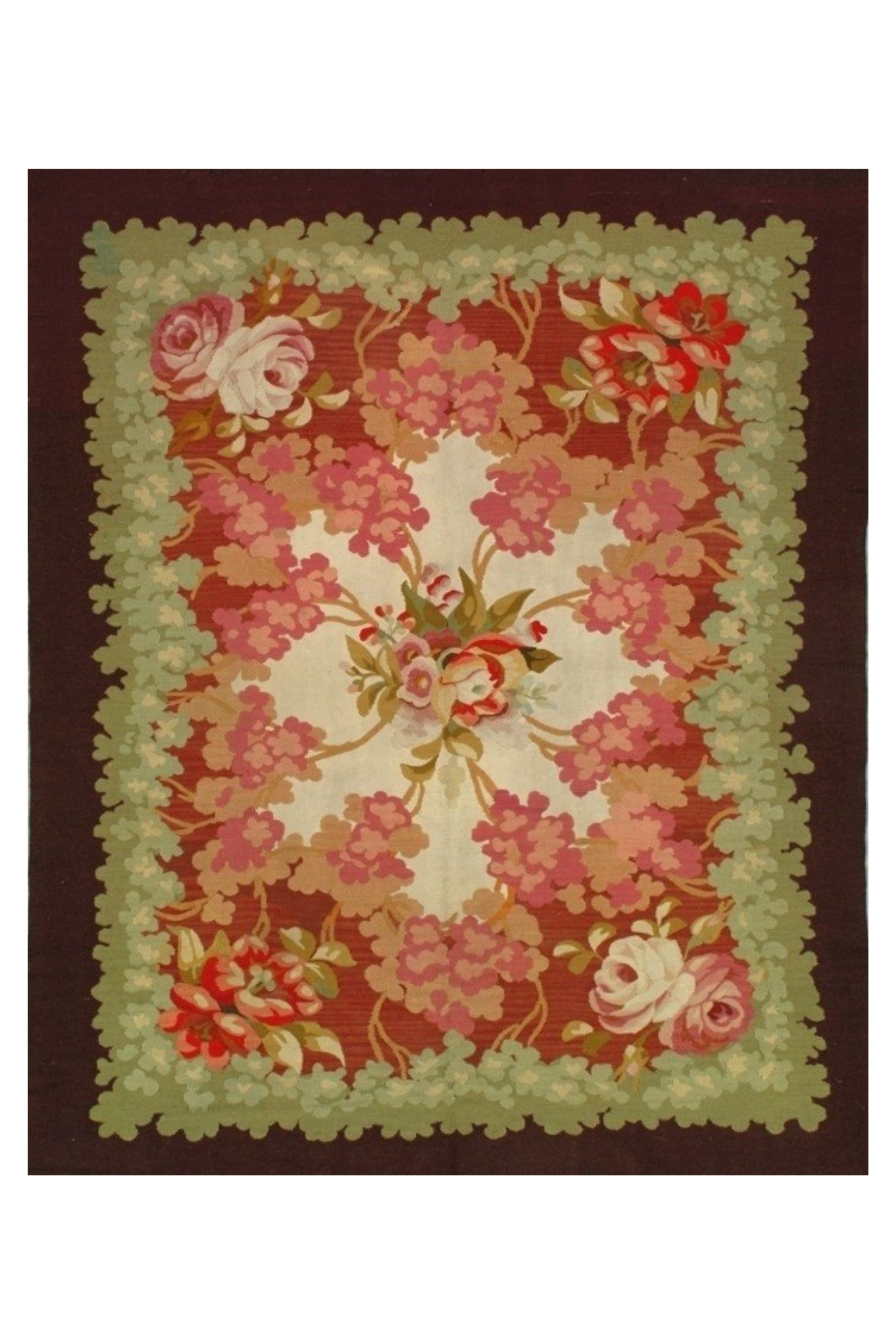 A rug with flowers and leaves on it