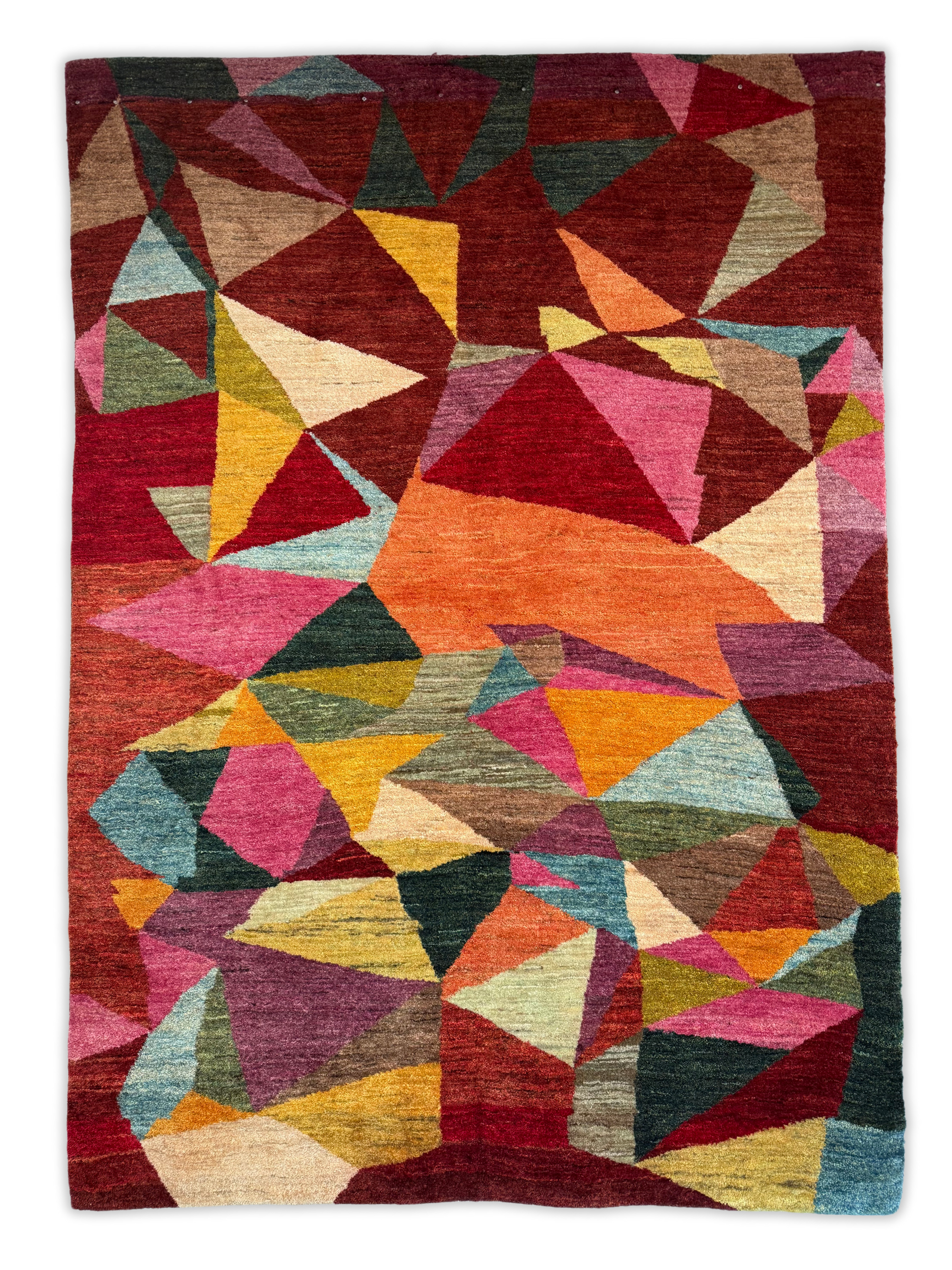 A colorful rug with a geometric pattern on it
