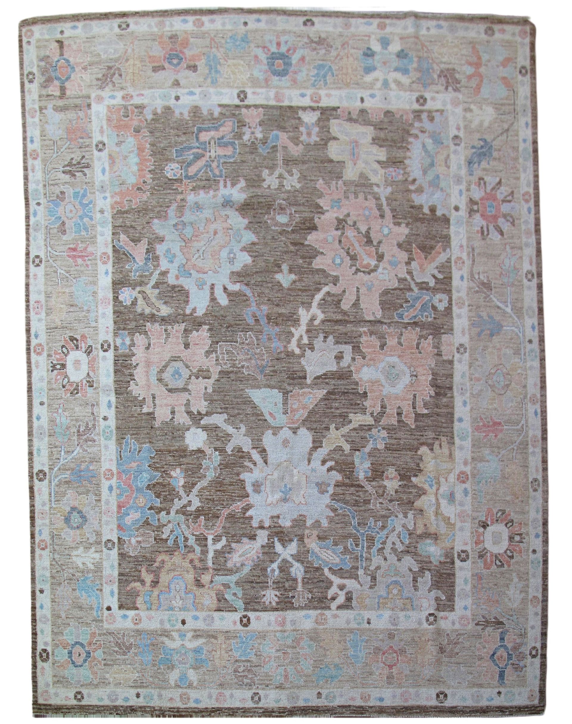 A rug with a floral pattern on it is on a white background