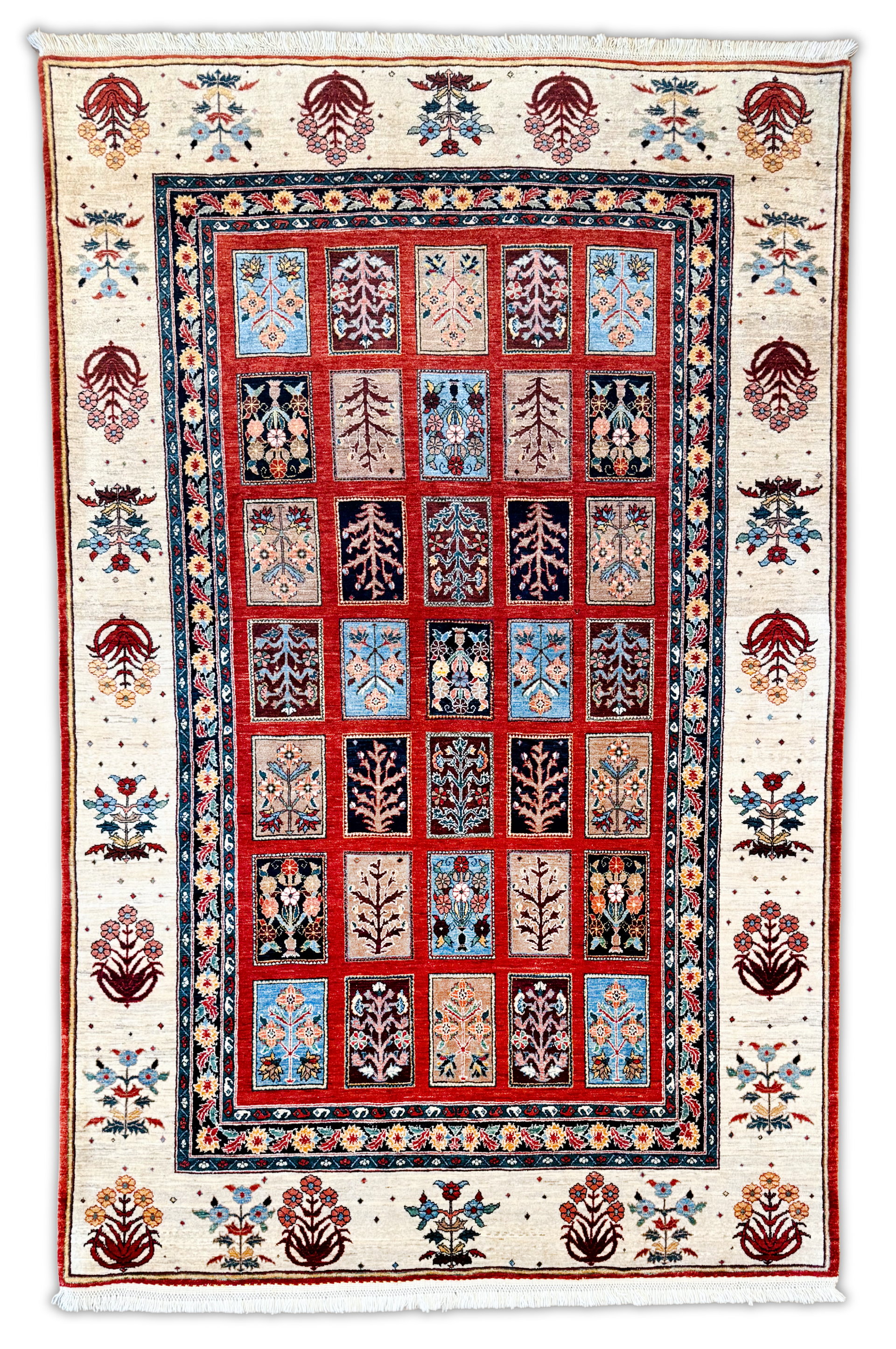 A rug with a floral pattern on it is on a white background.