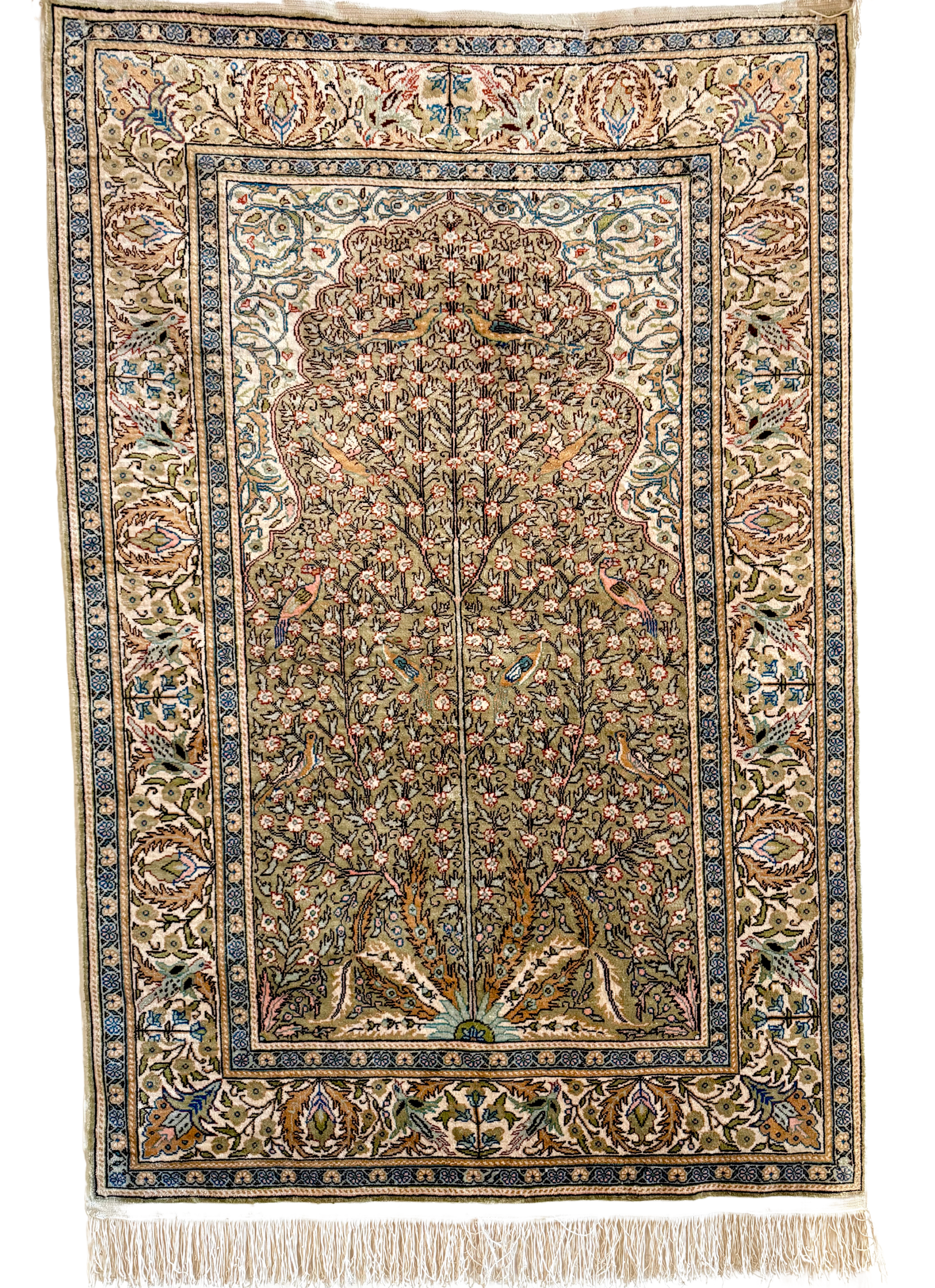 A rug with a tree on it on a white background.