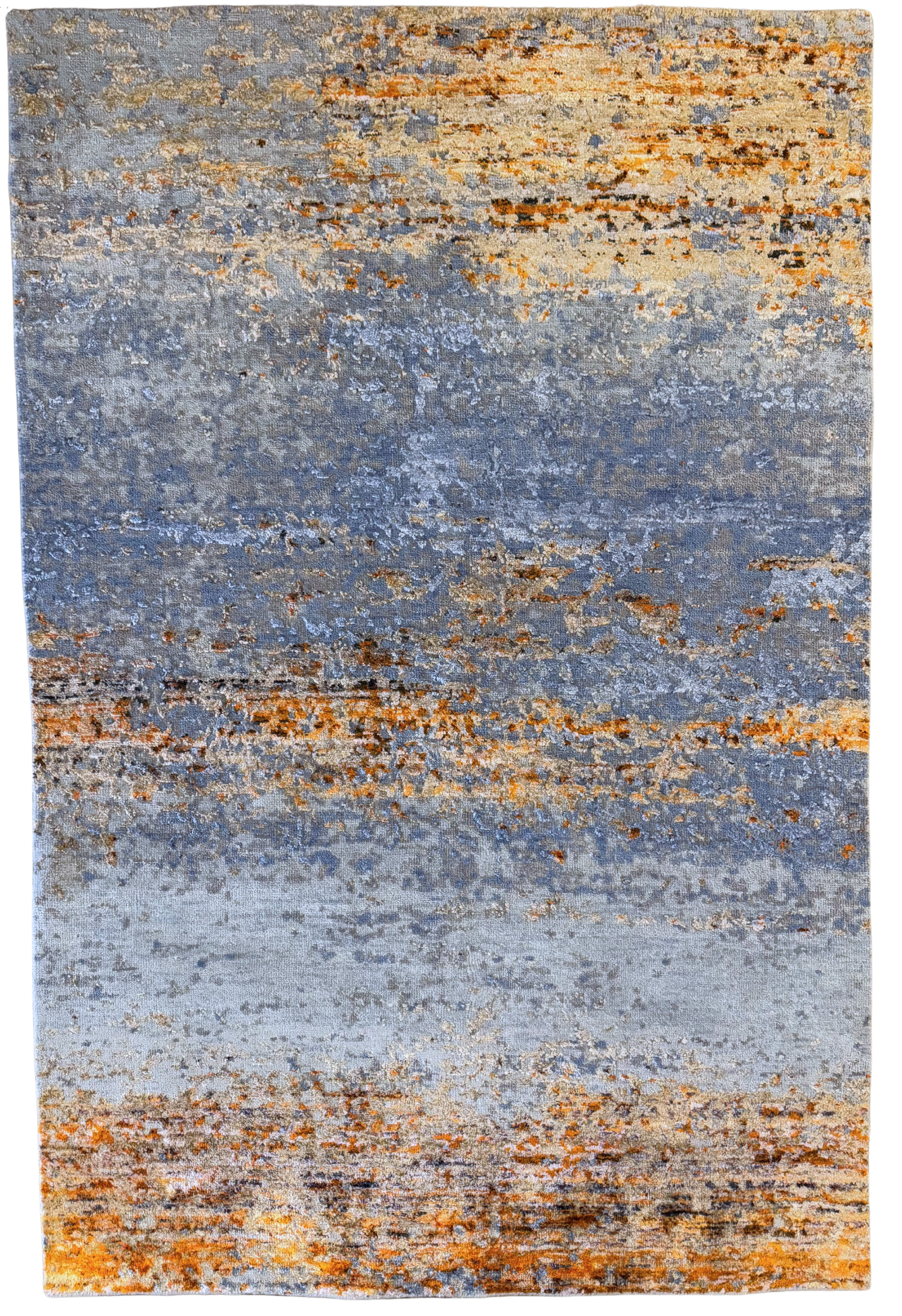 A rug with a blue and orange pattern on a white background.