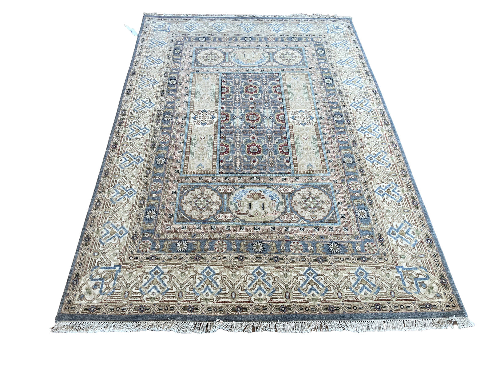 A rug with a pattern on it is on a white background.