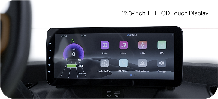 A 12.3-inch TFT LCD touch display in a car shows apps and driving data on a dark dashboard.