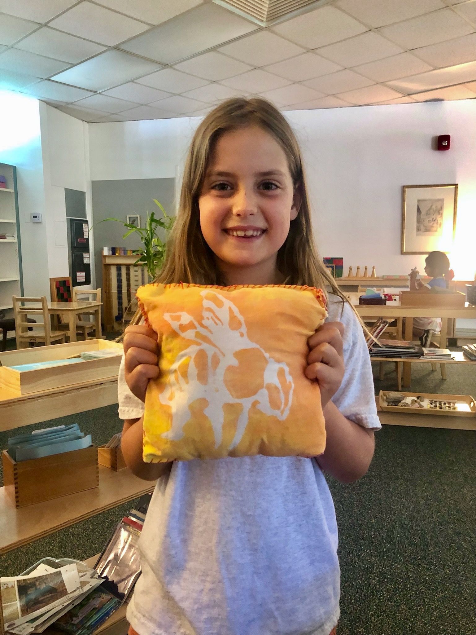 montessori child with drawing