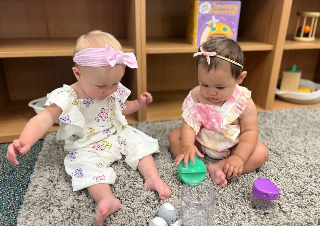 Montessori Infants working together in the classroom.