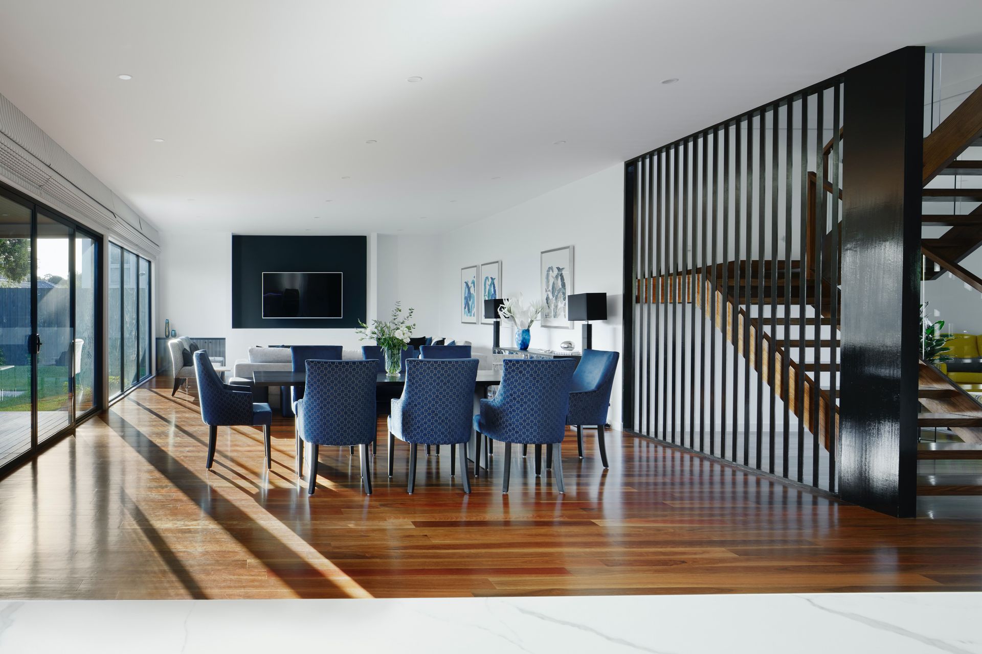 Modern unit with blue accent furniture and decor.