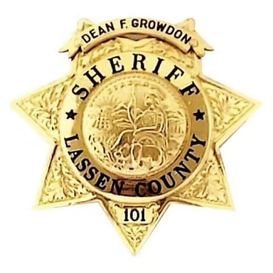 A gold-toned, seven-pointed Lassen County Sheriff badge engraved with 