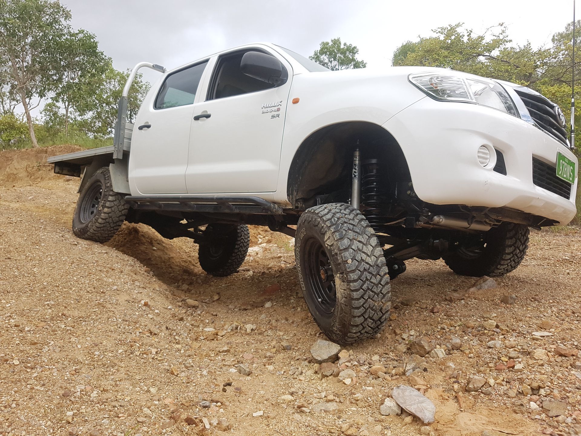 A Dark Gray Pickup Truck with Off-Road Modifications — Ironhide Customs In Garbutt, QLD