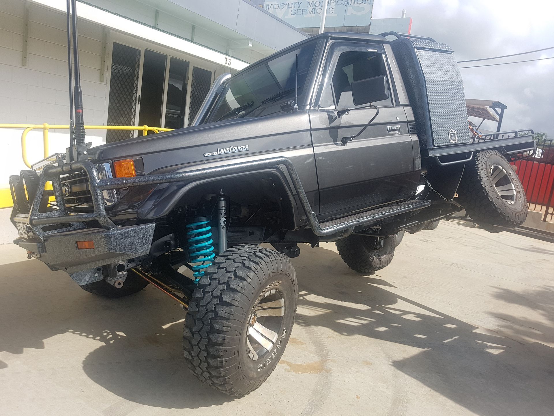 A Black Off-Road Pickup Truck — Ironhide Customs In Garbutt, QLD