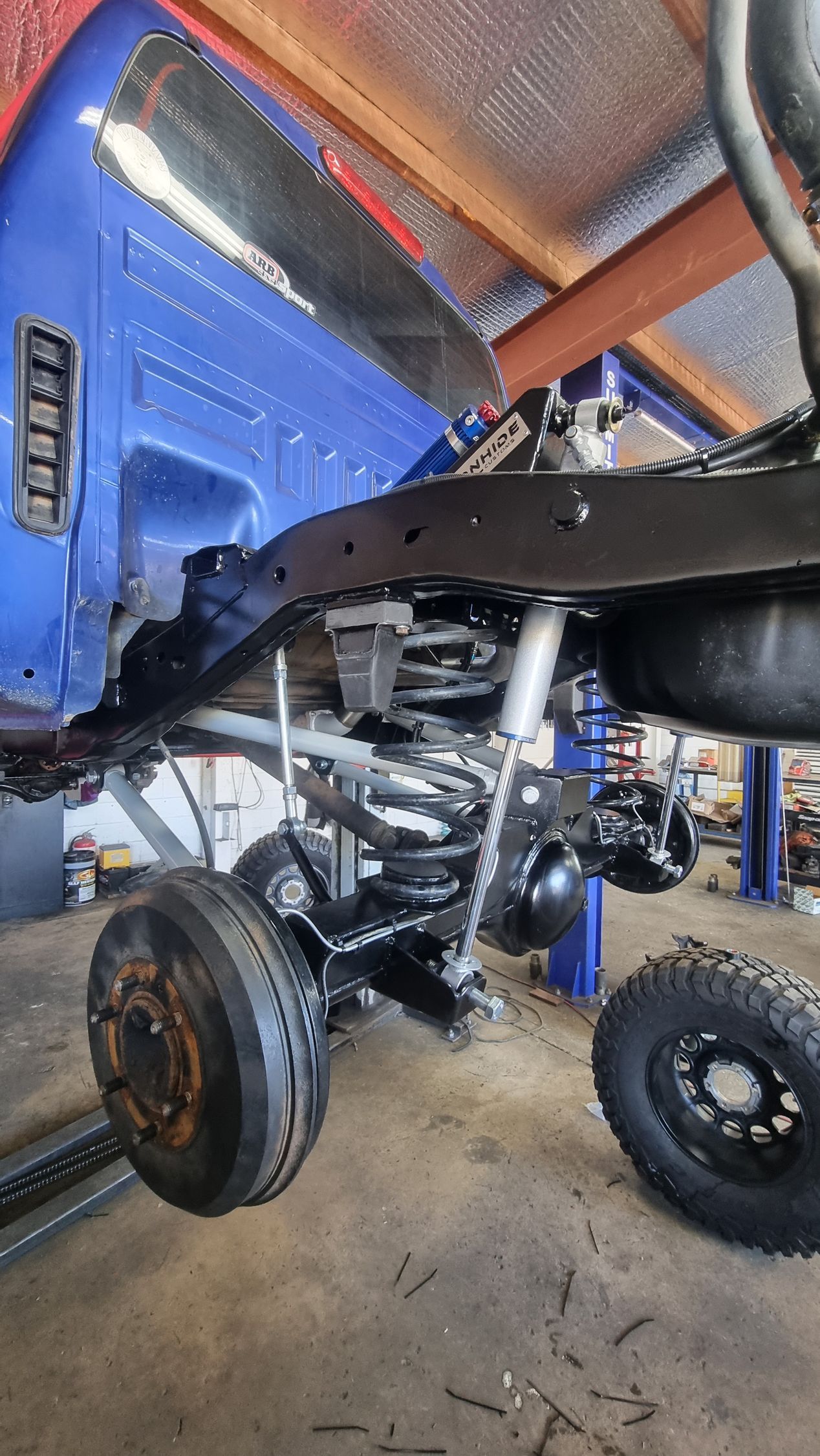 A Colorado DMAX Showing the Rear Coil — Ironhide Customs In Garbutt, QLD
