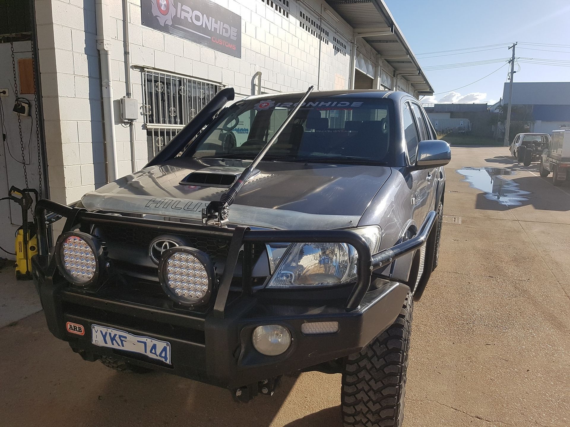 Black Pickup Truck With Off-road Bumper — Ironhide Customs In Garbutt, QLD