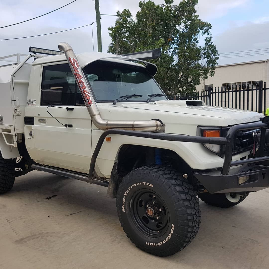 White Lifted Off-road Truck With Snorkel and Black Bull Bar — Ironhide Customs In Garbutt, QLD