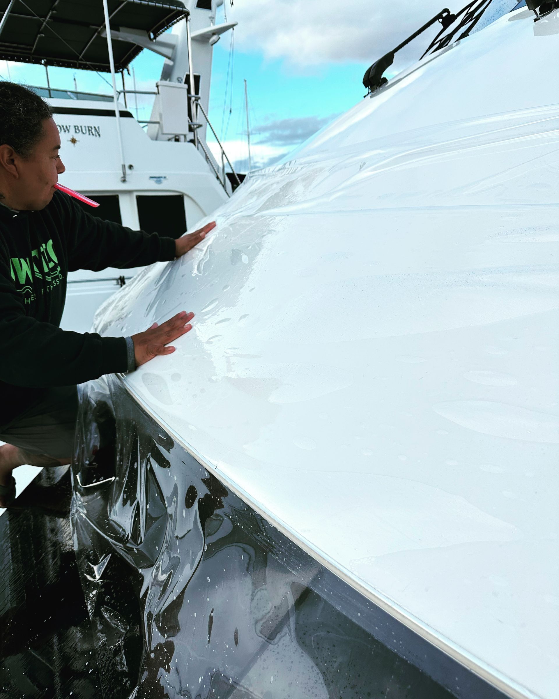 A man in a black shirt with the word king on it