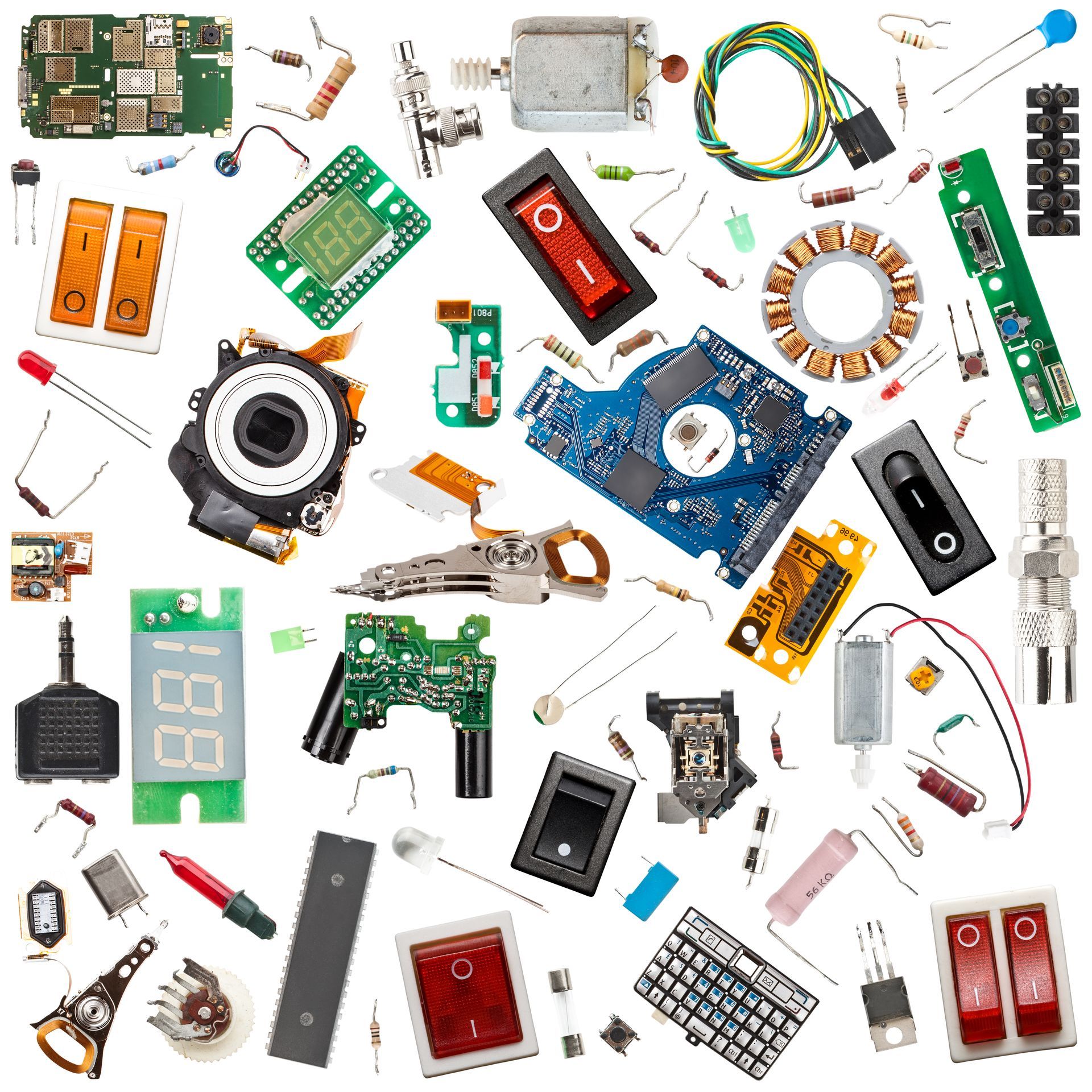 A bunch of electronic components on a white background
