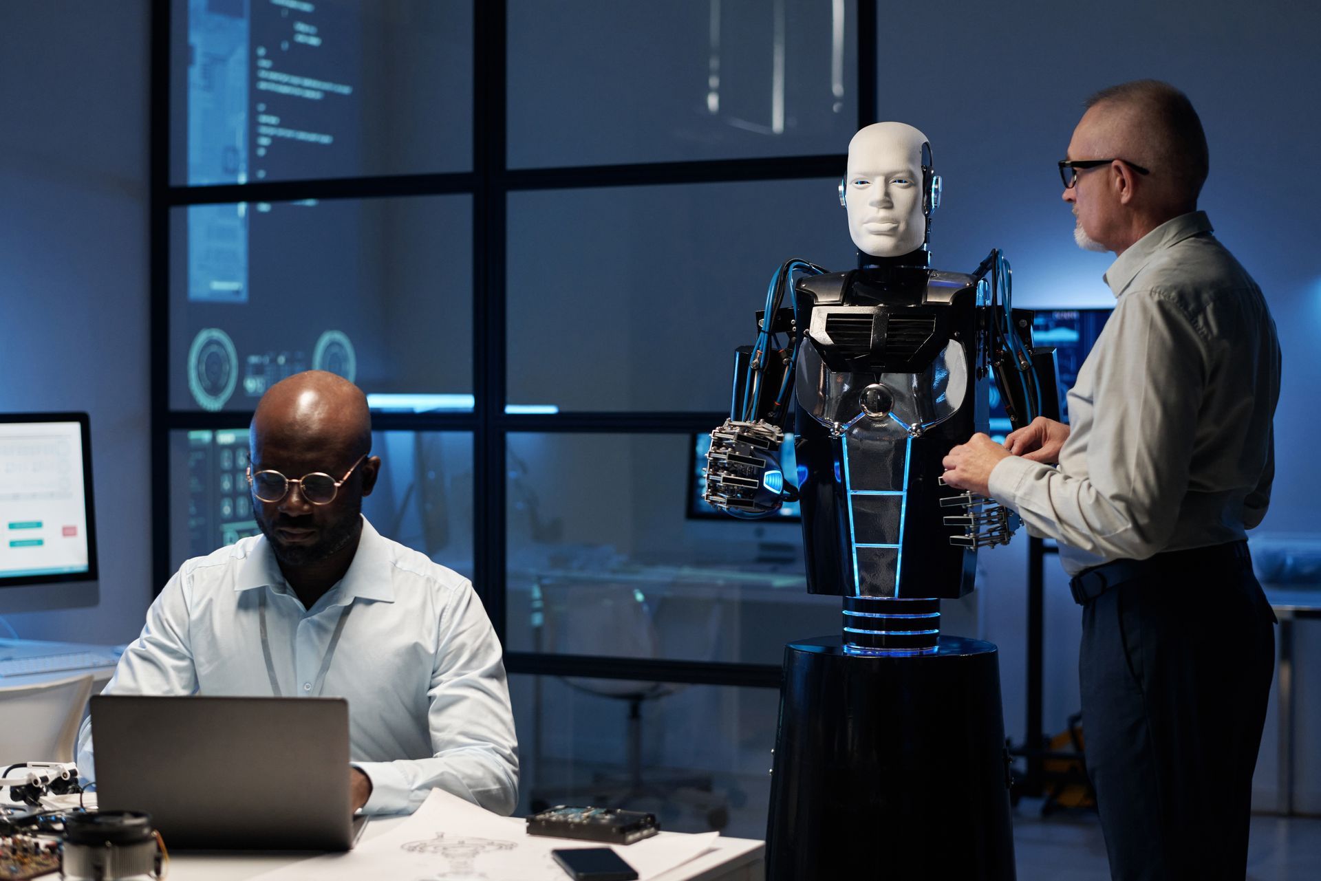 engineers-programming-robot-in-the-lab