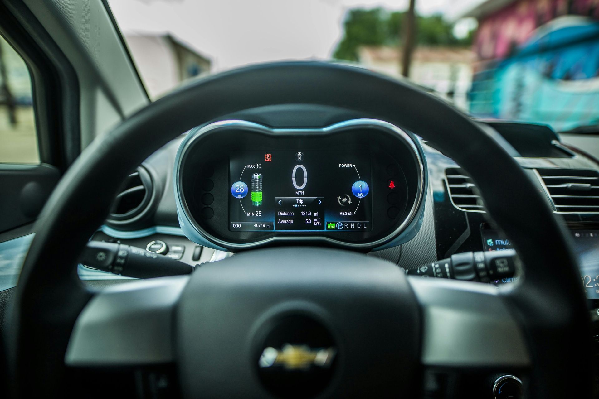 Modern automotive digital dashboard displaying electronic systems and controls