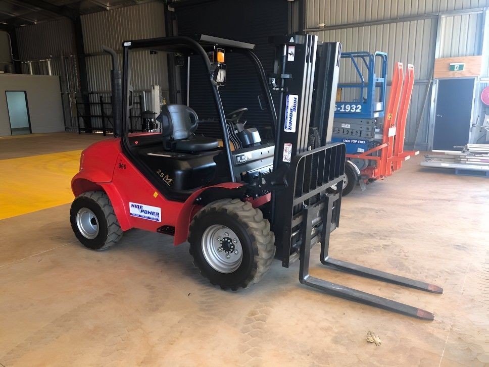 A Red Forklift is Parked in a Warehouse — Hire Power NT in Berrimah, NT
