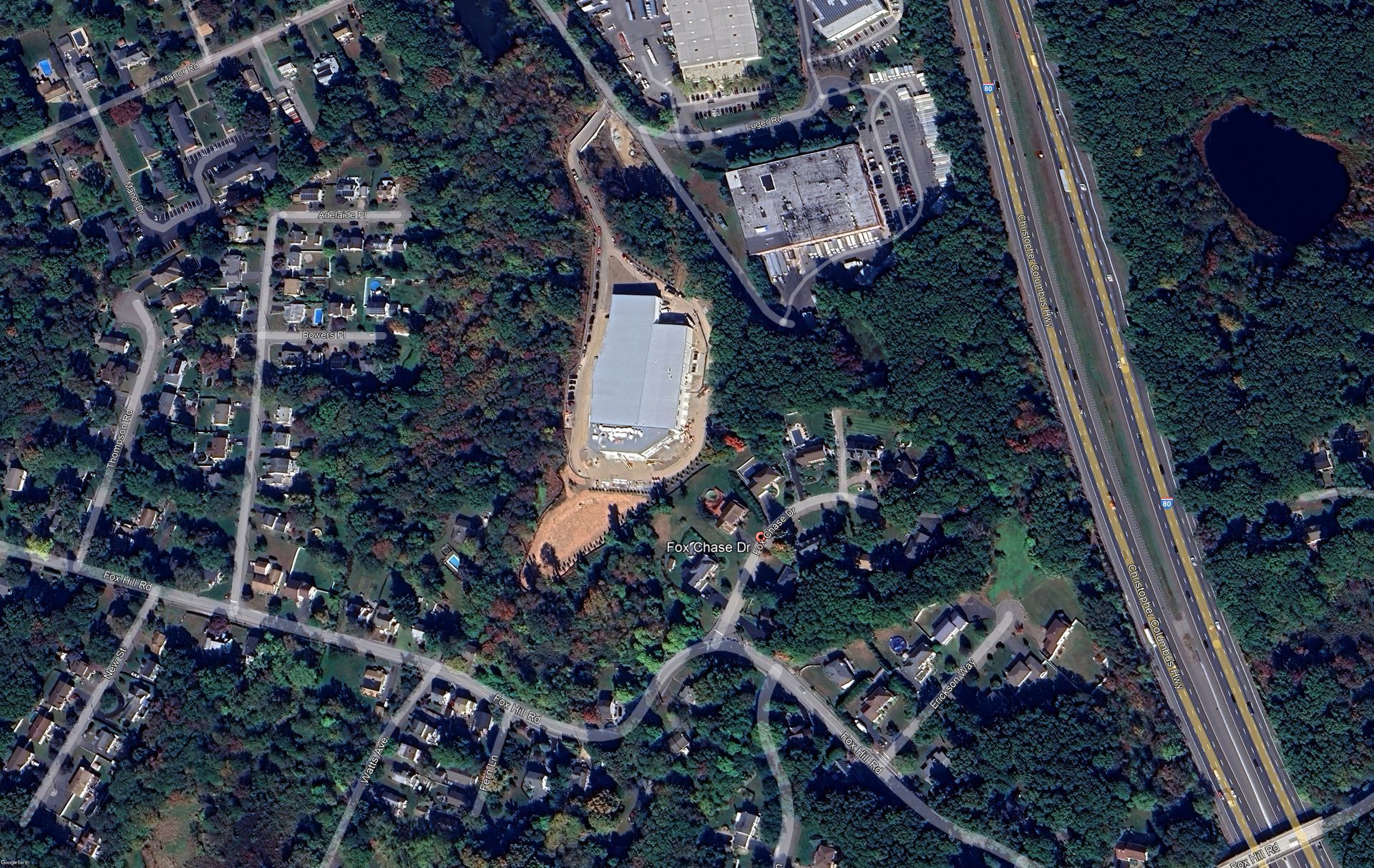 2004 Satellite image 2024 showing conditions after the Weiss-Aug development. Large warehouse and significant tree clearing