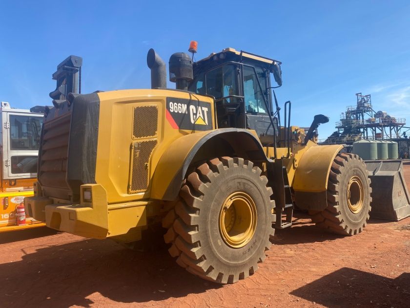 A Yellow Cat Bulldozer Is Parked On A Dirt Road — Advanced Weighing Technology NT Pty Ltd In Nhulunbuy, NT